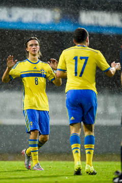 Sveriges Kristoffer Olsson och Kerim Mrabti jublar