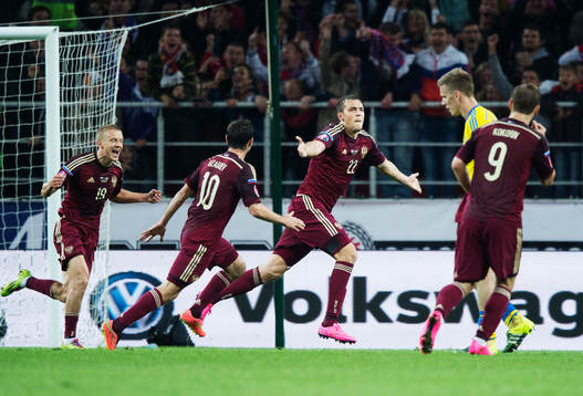 Rysslands Igor Smolnikov, Alan Dzagoev och Artem Dzyuba