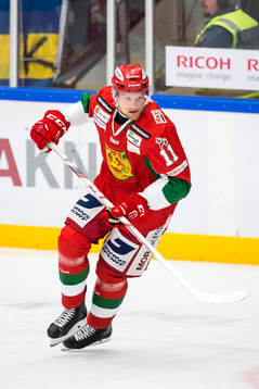 Moras Alexander Hilmerson i ishockeymatchen i