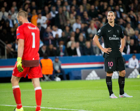 s Zlatan Ibrahimovic och Malmös målvakt Johan Wiland