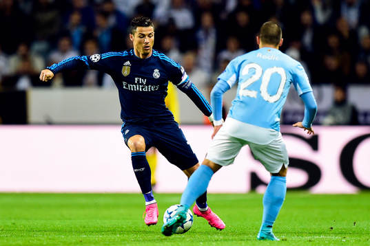 Real Madrids Cristiano Ronaldo och Malmö FFs Vladimir Rodic