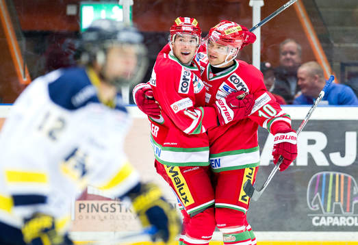 Modos Bobby Buttler och Per-Åge Skröder jublar