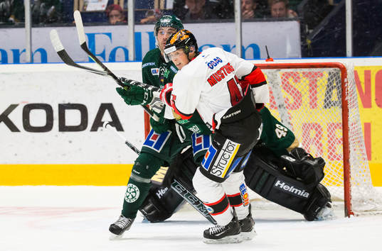 Färjestads Niclas Arell och Örebros Joel Mustonen