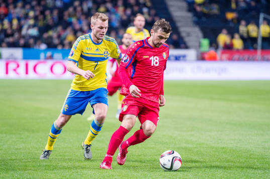 Sveriges Sebastian Larsson och Moldaviens Artur Patraş