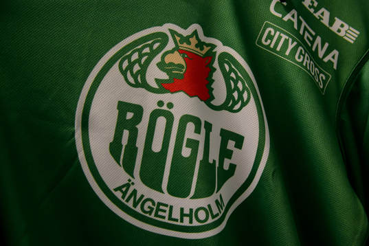 Rögles klubbemblem på en tröja