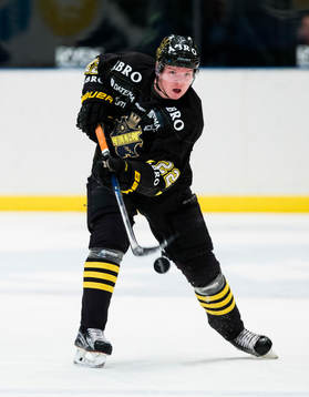 s Jonathan Léman med pucken