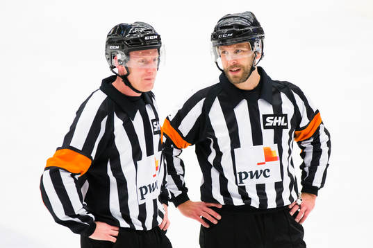 Domare Mikael Holm och Domare Marcus Linde