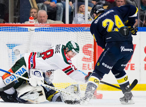 s målvakt Fredrik Pettersson-Wentzel och Erik Christensen