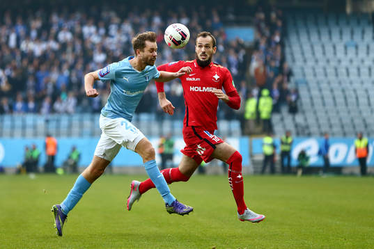 Malmö FFs Kari Arnason och Norrköpings Emir Kujovic