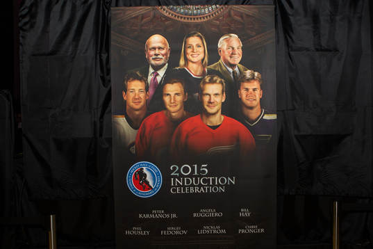 The Ice Hockey Hall of Fame induction poster located at the
