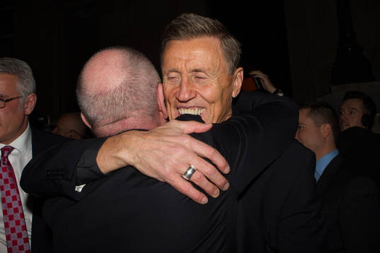 Borje Salming hugs Larry Tanenbaum
