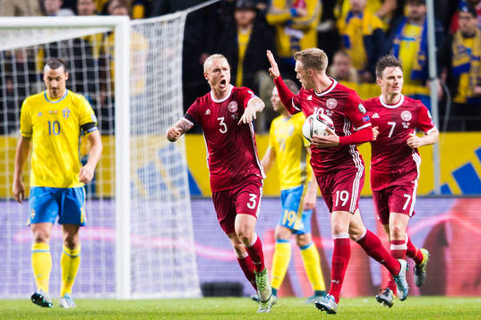 Danmarks Simon Kjär (tv) och Nicolai Jörgensen (th) jublar