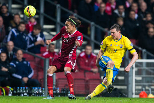 Danmarks Yussuf Poulsen och Sveriges Kim Källström