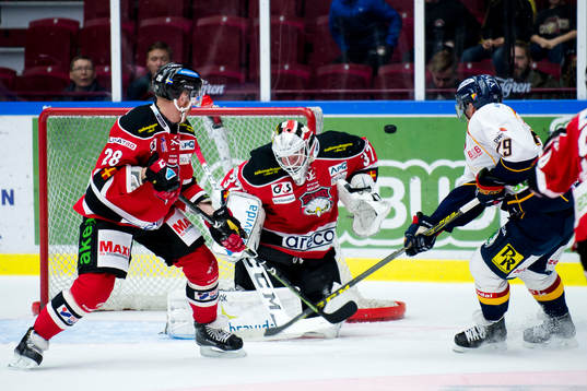 Malmö Redhawks  Jens Olsson och målvakt Jonas Gunnarsson