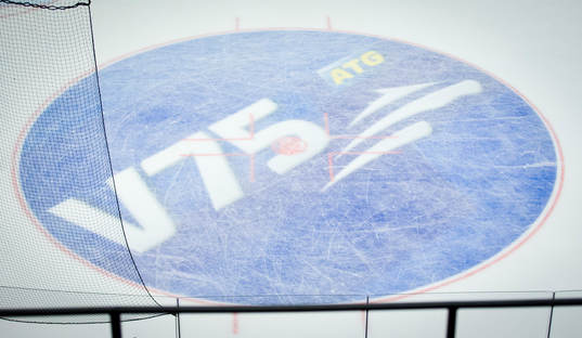 En tekningscirkel med V75 logotyp