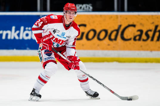 Timrås Andreas Molinder med pucken