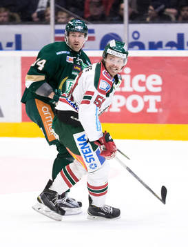 Färjestads Tomas Skogs och Frölundas Mats Rosseli Olsen