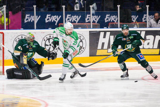 Färjestads målvakt Justin Pogge och Rögles Ludvig