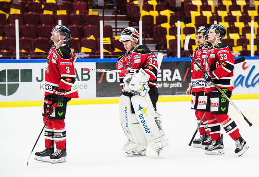 Malmö Redhawks Kent McDonell, målvakt Jonas Gunnarsson,