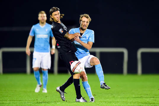 Midtjyllands Kristoffer Olsson och Malmö FFs Magnus Wolff