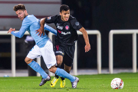 Malmö FFs Erdal Rakip och Midtjyllands Morten Rasmussen