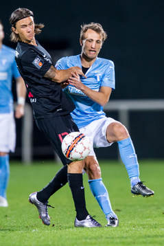 Midtjyllands Kristoffer Olsson och Malmö FFs Magnus Wolff