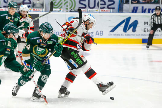 Färjestads Rasmus Asplund och Malmö Redhawks Eric