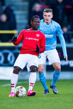 Ålborgs Christian Bassogog och Malmö FFs Piotr Johansson