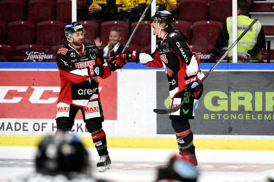 Malmö Redhawks Eric Himelfarb och Peter Mueller jublar