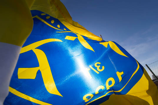 Falkenbergs FFs logga på en flagga
