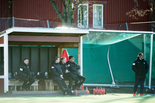 Athletics bänk och tränarstab