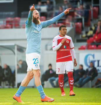 Malmö FFs Jo Inge Berget jublar och Kalmars Ismael Silva