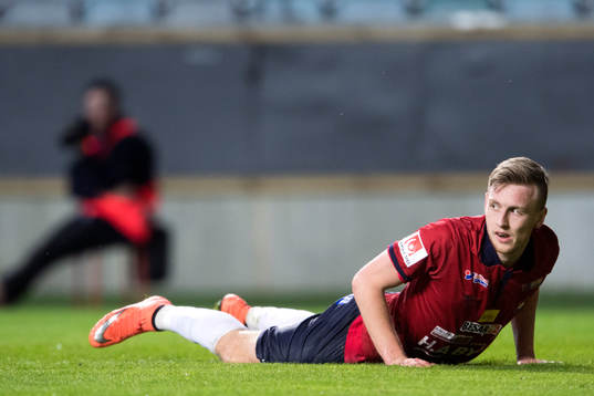 Örgrytes Sebastian Olsson ligger på gräset