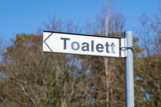 Skylten toalett