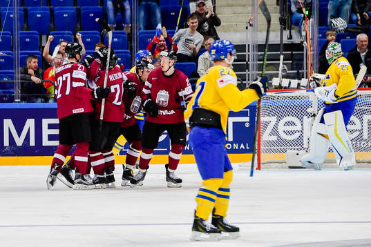 Lettlands spelare jublar