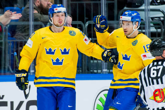 Sveriges Martin Lundberg (tv) och Mattias Sjögren jublar