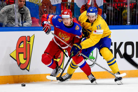 Rysslands Yevgeni Kuznetsov och Sveriges Mattias Sjögren