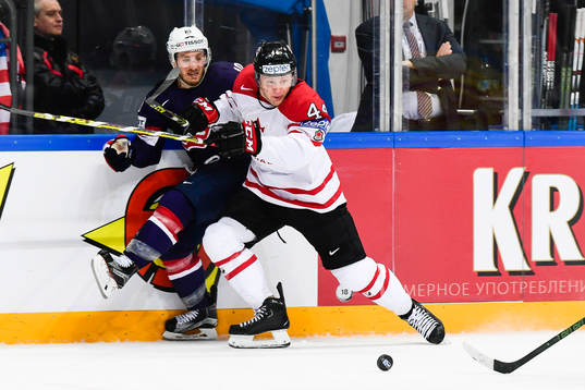 s Jordan Schroeder och Kanadas Morgan Rielly