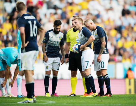 Sveriges Jimmy Durmaz, Sebastian Larsson och John Guidetti