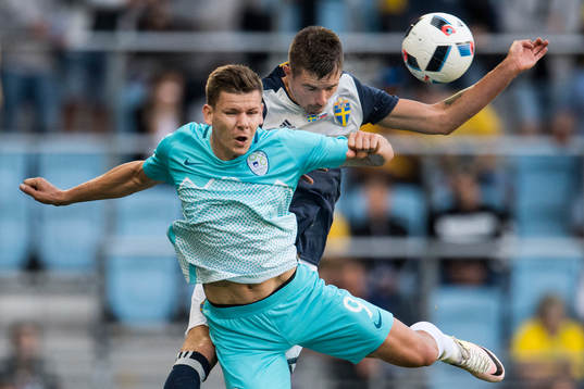 Sloveniens Roman Bezjak och Sveriges Mikael Lustig