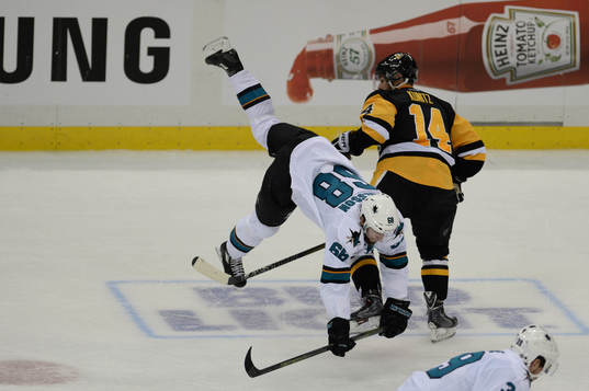 Pittsburgh Penguins left winger Chris Kunitz (14) checks