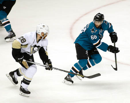 San Jose Sharks right wing Melker Karlsson (68) and