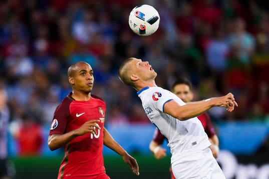 Portugals Joao Mario och Islands Johann Gudmundsson