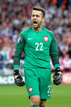 Polens målvakt Lukasz Fabianski jublar