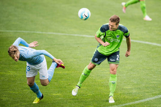 Malmö FFs Teddy Bergqvist och Odense Kenneth Emil Petersen