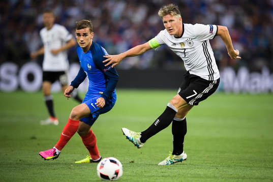 Frankrikes Antoine Griezmann och Tysklands Bastian