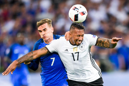 Frankrikes Antoine Griezmann och Tysklands Jerome Boateng