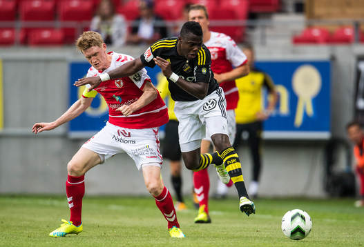 s Patrick Kpozo och Kalmars Rasmus Elm som blir varnad för