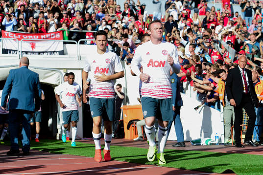 Manchester Uniteds Wayne Rooney före fotbollsmatchen