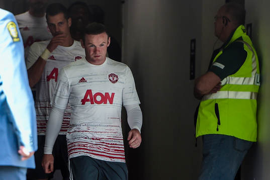 Manchester Uniteds Wayne Rooney före fotbollsmatchen